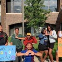 Black Excellence Orientation 2019 students holding signs 5